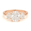 Three stone cushion cut diamond engagement ring rose gold