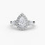 Diamond ring with a pear-shaped center stone on a white background
