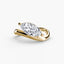 Gold curved ring with a marquise-shaped diamond on a white background