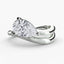 Silver ring with a heart-shaped diamond on a white background