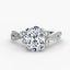 Oval diamond with side stones and micro paring on the shank on the white background