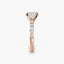 Rose gold ring with a diamond on a white background