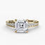Gold ring with a large asscher-cut diamond and smaller diamonds on the band against a white background