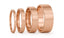 Four rose gold brushed flat ring styles  of different width and sizes on a white background.