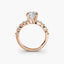 Rose gold ring with a diamond on a white background