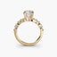 Gold ring with a diamond on a white background