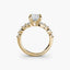 Gold ring with a diamond on a white background