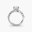 Diamond ring with a central diamond and smaller stones on a white background