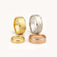 Collection of Ivanov Jewelry hammered gold wedding bands in yellow, white, and rose gold with various widths