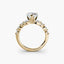 Gold ring with a diamond on a white background