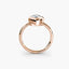 Side view of The Novara showing marquise diamond in protective rose gold bezel with pointed ends secured