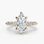 Gold ring with a marquise-cut diamond on the center and side stones marquise round on a white background