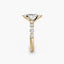 Gold ring with a diamond on a white background