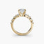Gold ring with a diamond on a white background