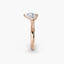 Profile view of The Zevara showing pear cut diamond with protected point in double prong setting