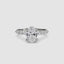Diamond ring with a central oval-cut diamond and smaller round and marquise diamonds platinum on a white background