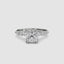 White Gold ring with a large cushion cut diamond and smaller marquise shaped and round cut diamonds on the band against a white background