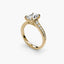 Gold ring with a diamond on a white background