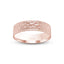 Rose gold ring with hammered textured surface 6mm width on a white background