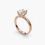 Round brilliant cut diamond solitaire engagement ring with double prong setting in rose gold