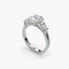 Diamond ring with three stones on a white background