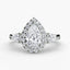 Halo Three Stone Diamond ring with a pear-shaped center stone in white gold