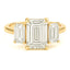 Three stone emerald cut diamond solitaire engagement ring yellow gold