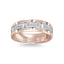 Rose gold and white gold ring with embedded diamonds on a white background
