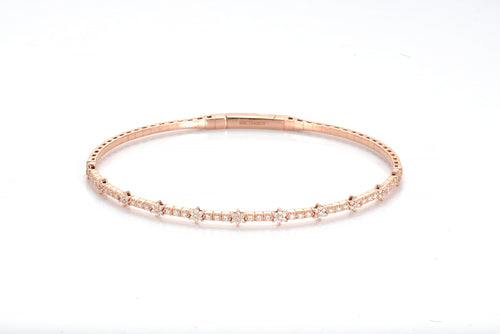 Aurora Whisper: 14K Gold Flexible Diamond Bracelet with Star Design