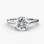 Round diamond solitaire engagement ring white gold on a white background