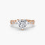 Rose gold ring with a heart-shaped diamond on a white background
