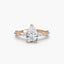 Rose gold ring with a pear-shaped diamond on a white background