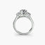 Three stone engagement ring with u pave on the shank white gold