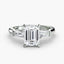 Diamond ring with emerald-cut center stone and tapered baguetted-shaped side stones on a white background