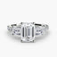 Three stone diamond ring with emerald-cut center stone and side stones u pave shank white gold on a white background