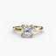 Gold ring with a cushion diamond on a white background