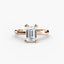 Rose gold ring with a emerald-cut diamond on a white background