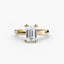 Gold solitaire engagement ring with a large emerald-cut diamond on a white background