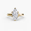 Gold ring with a marquise-shaped diamond on a white background