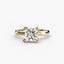 Gold solitaire ring with a large princess-cut diamond on a white background