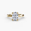 Gold ring with a large diamond on a white background