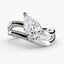 Diamond ring with a pear-shaped gemstone on a white background