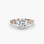 Rose gold ring with a heart-shaped diamond on a white background