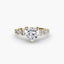 Gold ring with a heart-shaped diamond on a white background