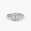 Oval diamond engagement ring with round diamonds on the band on a white background