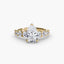 Gold ring with a pear-shaped diamond on a white background