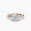 Rose gold ring with a large Asscher cut diamond and smaller diamonds on the band against a white background