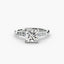 Diamond ring with a large princess cut central gemstone and smaller stones on a white background
