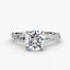 Round diamond twist ring with a micro pave on the side on a white background