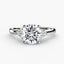 Round diamond solitaire engagement ring with three round side stones white gold on a white background